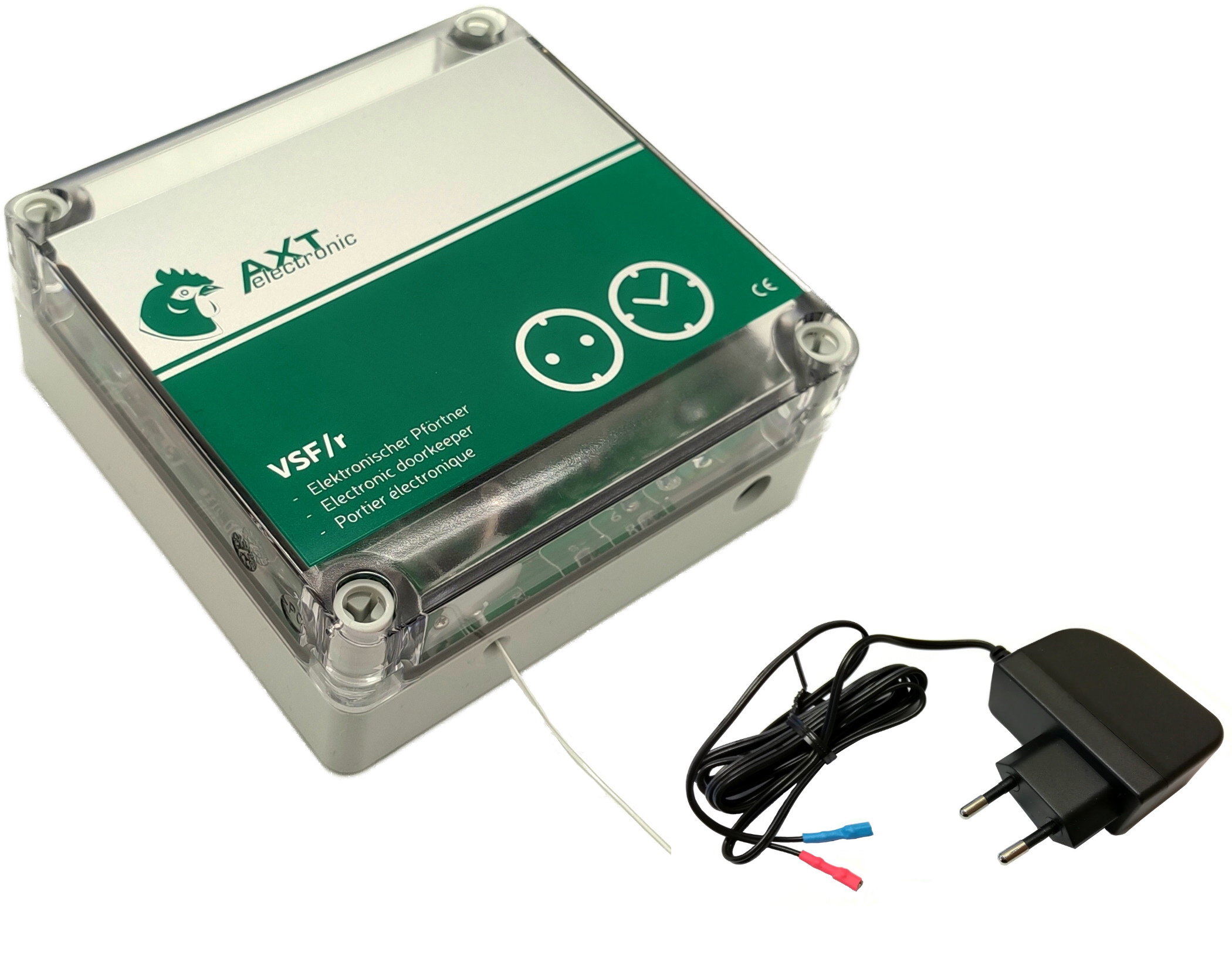 Graues, rechteckiges Elektronikgerät mit transparenter Abdeckung, Aufschrift „AXT electronic“ und „VSF/r Elektronischer Pförtner“, mit Symbolen für Steckdose und Uhrzeit. Daneben schwarzes 12V-Netzteil mit Eurostecker und 2 Kabelenden.